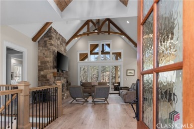 Discover the epitome of luxury living in this exquisite estate on Reynolds Lake Oconee - The Oconee in Georgia - for sale on GolfHomes.com, golf home, golf lot