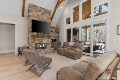Discover the epitome of luxury living in this exquisite estate on Reynolds Lake Oconee - The Oconee in Georgia - for sale on GolfHomes.com, golf home, golf lot