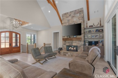 Discover the epitome of luxury living in this exquisite estate on Reynolds Lake Oconee - The Oconee in Georgia - for sale on GolfHomes.com, golf home, golf lot