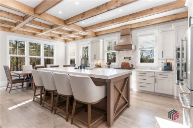 Discover the epitome of luxury living in this exquisite estate on Reynolds Lake Oconee - The Oconee in Georgia - for sale on GolfHomes.com, golf home, golf lot