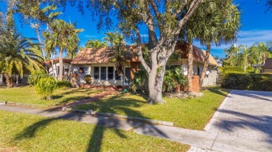 This property in the highly sought-after Hollywood Lakes is an on Hollywood Beach Golf and Country Club in Florida - for sale on GolfHomes.com, golf home, golf lot