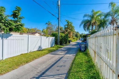 This property in the highly sought-after Hollywood Lakes is an on Hollywood Beach Golf and Country Club in Florida - for sale on GolfHomes.com, golf home, golf lot
