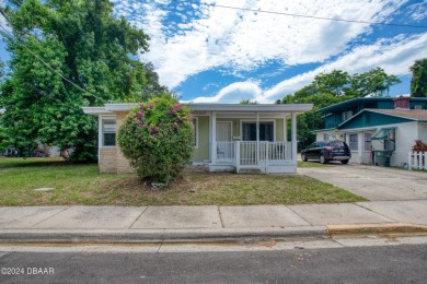 Looking for a cozy home with a convenient location near on Daytona Beach Golf Club in Florida - for sale on GolfHomes.com, golf home, golf lot