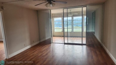 This lovely 2 Bedroom and 2 bathroom condo unit in a quiet on Oriole Golf and Tennis Club in Florida - for sale on GolfHomes.com, golf home, golf lot