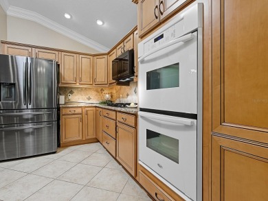 BOND PAID and TURNKEY! This stunning Designer Lily boasts a on The Links of Spruce Creek in Florida - for sale on GolfHomes.com, golf home, golf lot