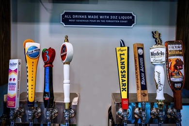 This high and dry lot overlooks a pond and the 12th green on St. James Bay in Florida - for sale on GolfHomes.com, golf home, golf lot