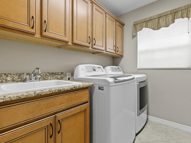 BOND PAID and TURNKEY! This stunning Designer Lily boasts a on The Links of Spruce Creek in Florida - for sale on GolfHomes.com, golf home, golf lot
