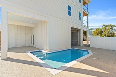 Welcome to 108 N 32nd St, a brand-new 4BR/3BA home perfectly on  in Florida - for sale on GolfHomes.com, golf home, golf lot