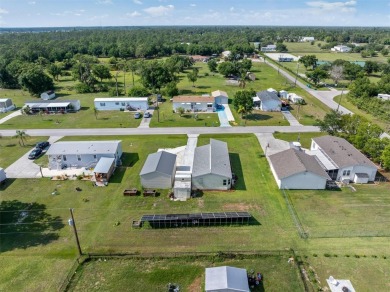 PERFECT HOME FOR YOU AND YOUR TOYS AND X FLOOD ZONE! Located on on Blue Heron Pines Golf Course in Florida - for sale on GolfHomes.com, golf home, golf lot