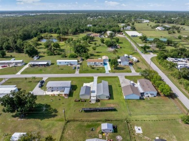 PERFECT HOME FOR YOU AND YOUR TOYS AND X FLOOD ZONE! Located on on Blue Heron Pines Golf Course in Florida - for sale on GolfHomes.com, golf home, golf lot
