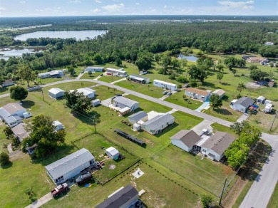 PERFECT HOME FOR YOU AND YOUR TOYS AND X FLOOD ZONE! Located on on Blue Heron Pines Golf Course in Florida - for sale on GolfHomes.com, golf home, golf lot