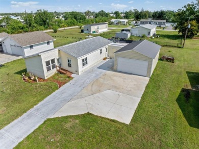 PERFECT HOME FOR YOU AND YOUR TOYS AND X FLOOD ZONE! Located on on Blue Heron Pines Golf Course in Florida - for sale on GolfHomes.com, golf home, golf lot