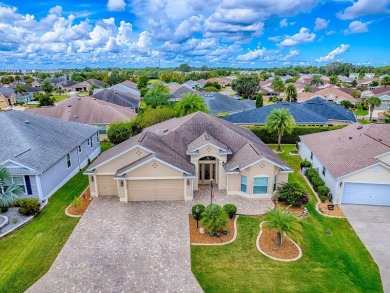 BOND PAID and TURNKEY! This stunning Designer Lily boasts a on The Links of Spruce Creek in Florida - for sale on GolfHomes.com, golf home, golf lot