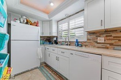 Beautifully remodeled, 1600 sq ft condo with attached garage in on Whiskey Creek Country Club in Florida - for sale on GolfHomes.com, golf home, golf lot