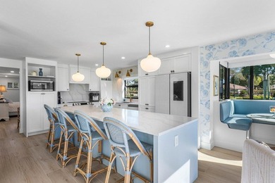 Stunning golf course views from this completely, beautifully on Quail Ridge Golf Course and Country Club in Florida - for sale on GolfHomes.com, golf home, golf lot