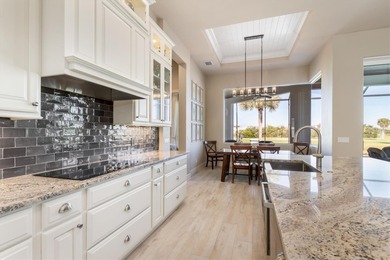 STUNNING SHOWSTOPPER! Custom-built by Harbor Home Builders, this on Saint Andrews South Golf Club in Florida - for sale on GolfHomes.com, golf home, golf lot