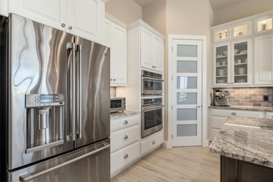 STUNNING SHOWSTOPPER! Custom-built by Harbor Home Builders, this on Saint Andrews South Golf Club in Florida - for sale on GolfHomes.com, golf home, golf lot