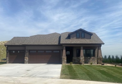 Brand new construction, fully landscaped. Located in Hidden on Hidden Bridge Golf Club in Wyoming - for sale on GolfHomes.com, golf home, golf lot