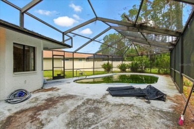 Unbeatable value in Pine Lakes Golf Community! Tucked away at on The Grand Club - Pine Lakes Course in Florida - for sale on GolfHomes.com, golf home, golf lot