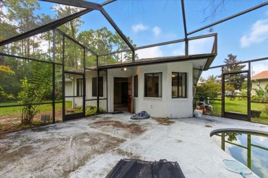Unbeatable value in Pine Lakes Golf Community! Tucked away at on The Grand Club - Pine Lakes Course in Florida - for sale on GolfHomes.com, golf home, golf lot