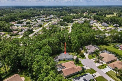 Unbeatable value in Pine Lakes Golf Community! Tucked away at on The Grand Club - Pine Lakes Course in Florida - for sale on GolfHomes.com, golf home, golf lot