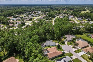 Unbeatable value in Pine Lakes Golf Community! Tucked away at on The Grand Club - Pine Lakes Course in Florida - for sale on GolfHomes.com, golf home, golf lot