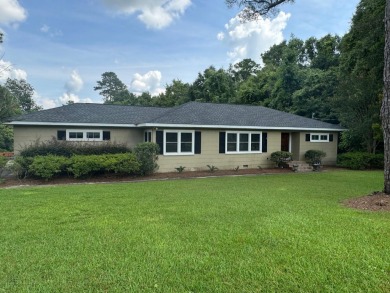 Welcome to this beautiful 4-bedroom, 3-bathroom home located in on Andalusia Country Club in Alabama - for sale on GolfHomes.com, golf home, golf lot