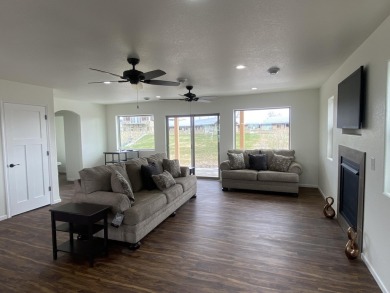 Brand new construction. Located in Hidden Bridge Ranch across on Hidden Bridge Golf Club in Wyoming - for sale on GolfHomes.com, golf home, golf lot