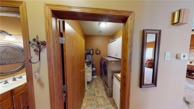 This two bed/two bath home has no steps anywhere, is close to on Green Lea Golf Course in Minnesota - for sale on GolfHomes.com, golf home, golf lot