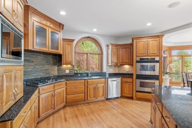 Welcome to this exceptional, all-brick custom home built by on Tamarack Golf Club in Illinois - for sale on GolfHomes.com, golf home, golf lot