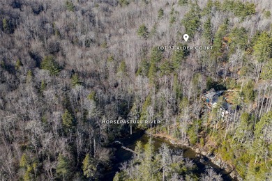 Wake up to the soothing sounds of the Horsepasture River from on Sapphire National Golf Club in North Carolina - for sale on GolfHomes.com, golf home, golf lot