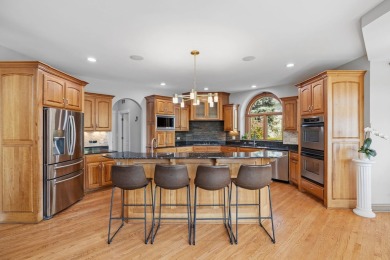 Welcome to this exceptional, all-brick custom home built by on Tamarack Golf Club in Illinois - for sale on GolfHomes.com, golf home, golf lot
