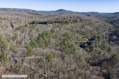 Wake up to the soothing sounds of the Horsepasture River from on Sapphire National Golf Club in North Carolina - for sale on GolfHomes.com, golf home, golf lot