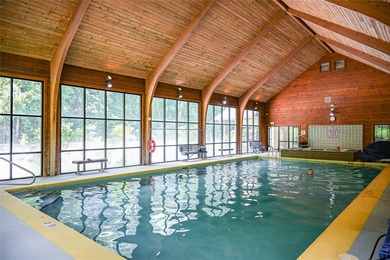 Wake up to the soothing sounds of the Horsepasture River from on Sapphire National Golf Club in North Carolina - for sale on GolfHomes.com, golf home, golf lot