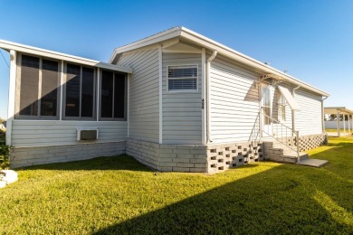 Welcome to this charming 2-bedroom, 2-bathroom manufactured home on Lily Lake Golf and RV Resort in Florida - for sale on GolfHomes.com, golf home, golf lot