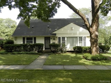 Nestled near the scenic Western Golf Course, this beautifully on Western Golf and Country Club in Michigan - for sale on GolfHomes.com, golf home, golf lot