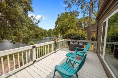 Enjoy captivating water views from nearly every room in this on Harbour Point Golf Club in North Carolina - for sale on GolfHomes.com, golf home, golf lot