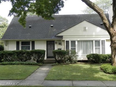 Nestled near the scenic Western Golf Course, this beautifully on Western Golf and Country Club in Michigan - for sale on GolfHomes.com, golf home, golf lot