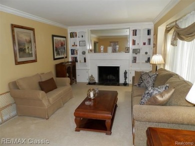 Nestled near the scenic Western Golf Course, this beautifully on Western Golf and Country Club in Michigan - for sale on GolfHomes.com, golf home, golf lot