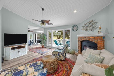Enjoy captivating water views from nearly every room in this on Harbour Point Golf Club in North Carolina - for sale on GolfHomes.com, golf home, golf lot