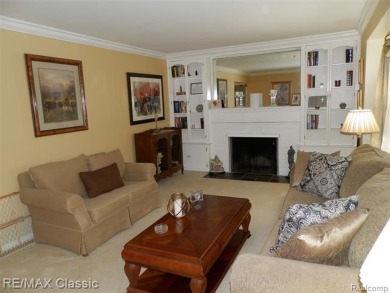 Nestled near the scenic Western Golf Course, this beautifully on Western Golf and Country Club in Michigan - for sale on GolfHomes.com, golf home, golf lot