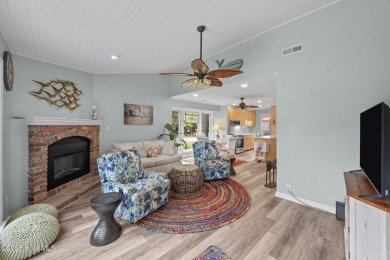 Enjoy captivating water views from nearly every room in this on Harbour Point Golf Club in North Carolina - for sale on GolfHomes.com, golf home, golf lot