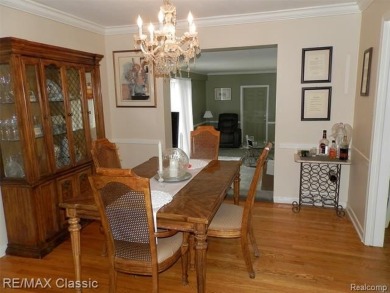 Nestled near the scenic Western Golf Course, this beautifully on Western Golf and Country Club in Michigan - for sale on GolfHomes.com, golf home, golf lot