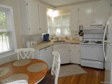 Nestled near the scenic Western Golf Course, this beautifully on Western Golf and Country Club in Michigan - for sale on GolfHomes.com, golf home, golf lot