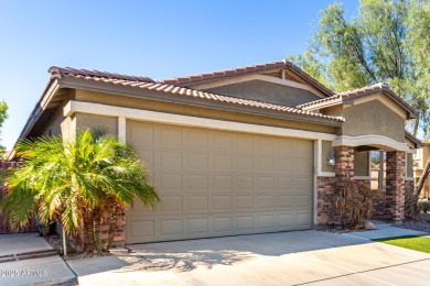 This 4-bedroom, 2-bathroom pool home in Johnson Ranch offers on The Golf Club At Johnson Ranch in Arizona - for sale on GolfHomes.com, golf home, golf lot