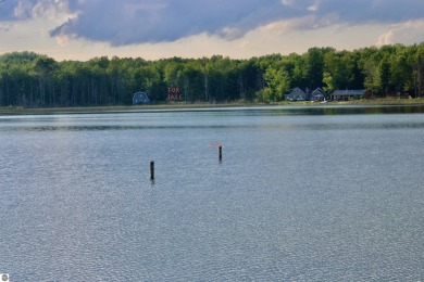 WATERFRONT Property with amenities galore! Build your house or on Lakes of the North Deer Run Golf Course in Michigan - for sale on GolfHomes.com, golf home, golf lot