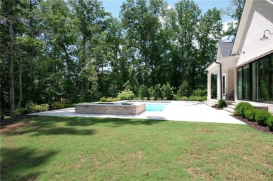 This exceptional golf course home is located in The Manor Golf on Manor Golf and Country Club in Georgia - for sale on GolfHomes.com, golf home, golf lot