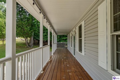 Welcome to this beautiful Cape Cod-style home nestled in on Doe Valley Country Club in Kentucky - for sale on GolfHomes.com, golf home, golf lot