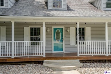 Welcome to this beautiful Cape Cod-style home nestled in on Doe Valley Country Club in Kentucky - for sale on GolfHomes.com, golf home, golf lot