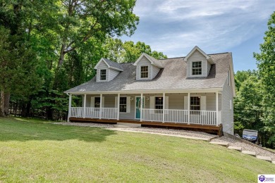 Welcome to this beautiful Cape Cod-style home nestled in on Doe Valley Country Club in Kentucky - for sale on GolfHomes.com, golf home, golf lot